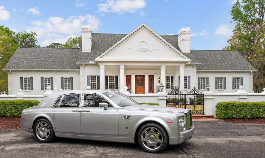 House with Rolls Royce